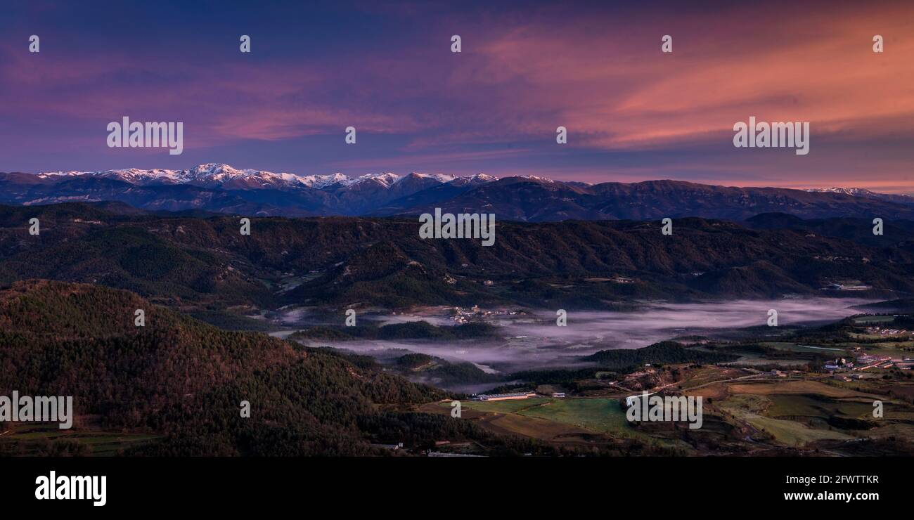 Winter sunrise at Santuari dels Munts sanctuary in Lluçanès. Views of the Eastern Pyrenees and the Puigmal summit (Barcelona, Catalonia, Spain) Stock Photo