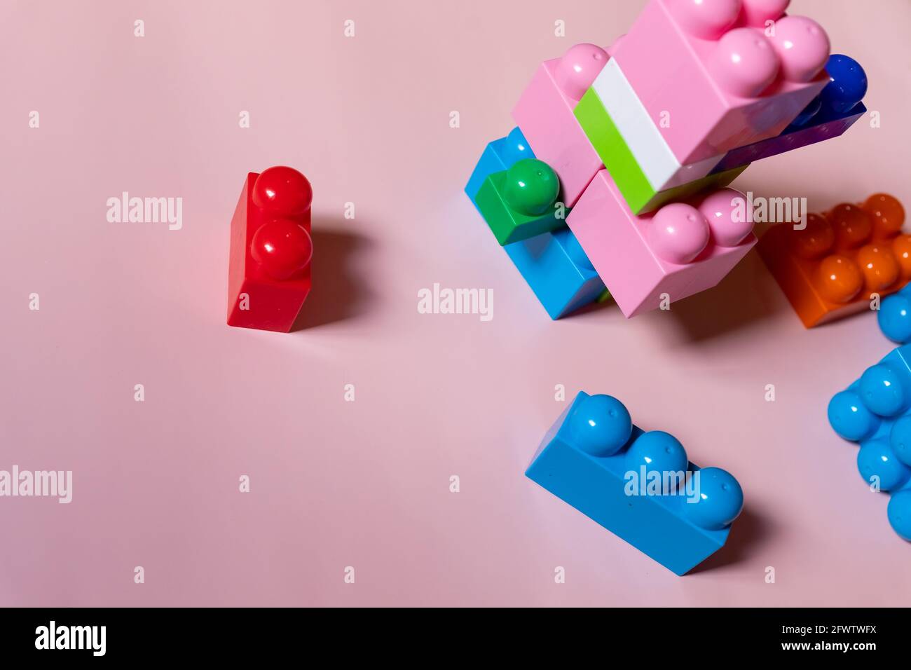 Colorful plastic construction blocks on white background as kids toys ...