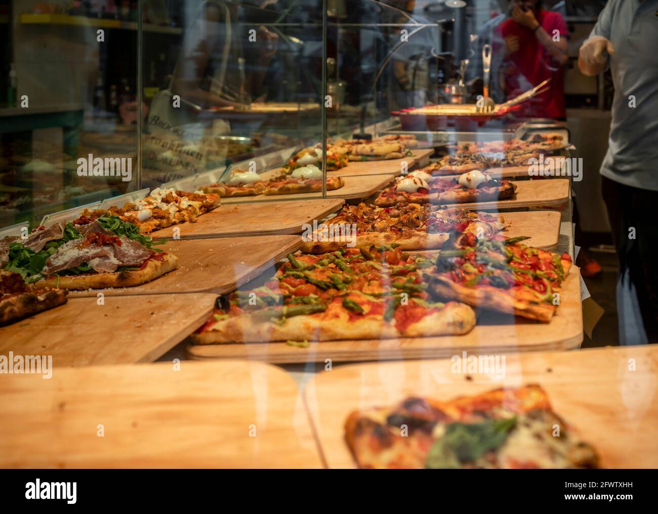 Pizza displayed a pizzeria in Union Square in New York on Saturday, May