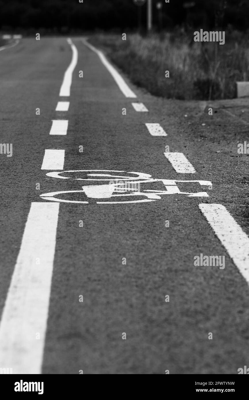 Road with bicycle path. Bicycle lane signage Stock Photo