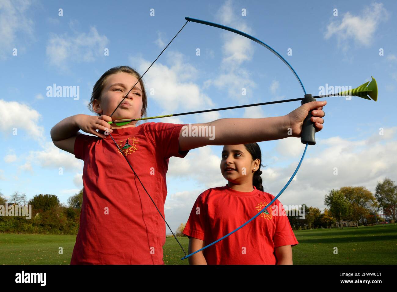 School children pupils girls Archery lesson Britain, Uk Stock Photo Alamy