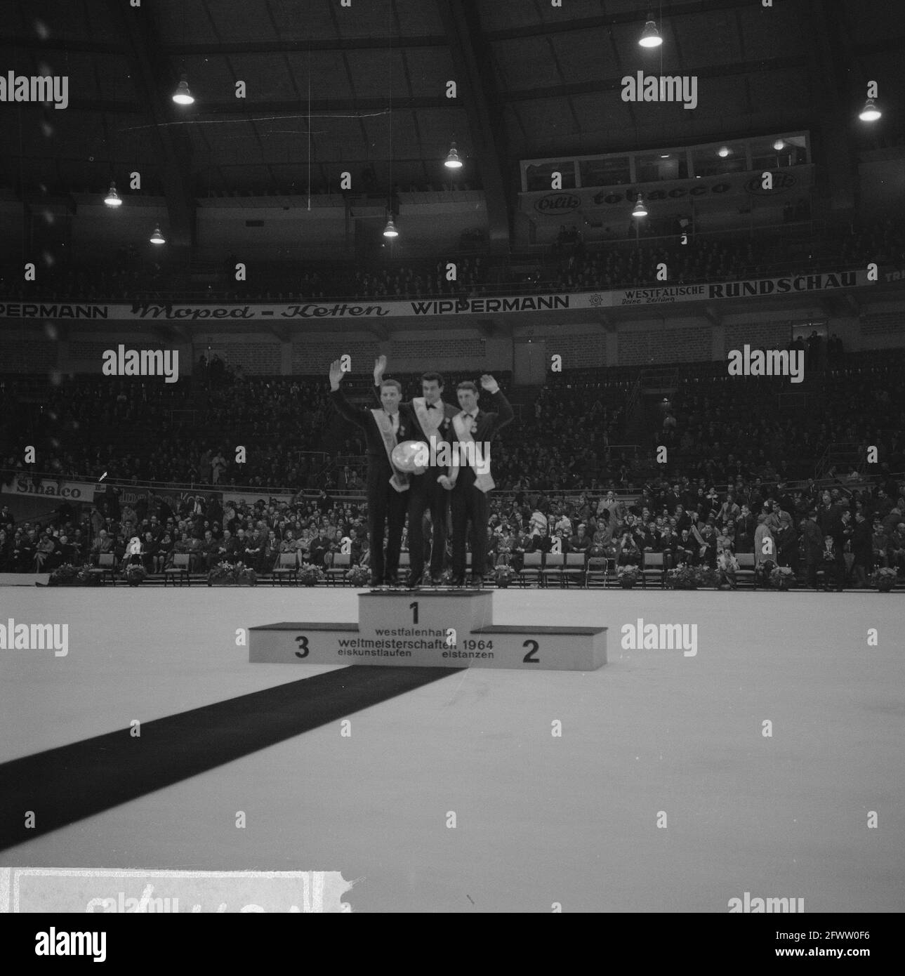 On honorary rostrum from left to right Karol Divin (Czechoslovakia), Manfred Schnelldorfer and Alain Calmat, February 29, 1964, figure skating, The Netherlands, 20th century press agency photo, news to remember, documentary, historic photography 1945-1990, visual stories, human history of the Twentieth Century, capturing moments in time Stock Photo