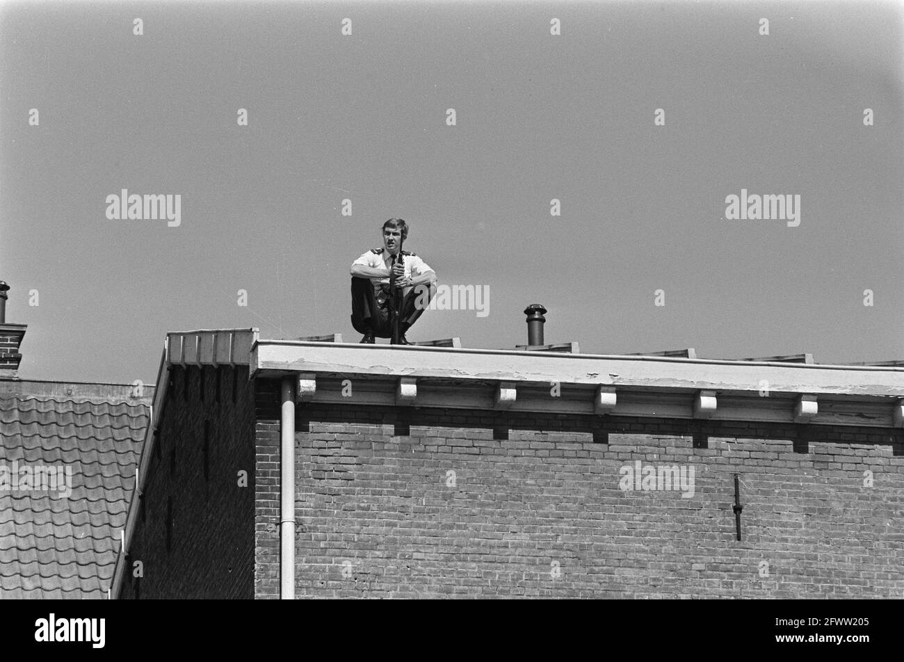 Trial of Palestinian airplane hijackers started in Haarlem sniper on roof, May 30, 1974, roofs, trials, snipers, airplane hijackers, The Netherlands, 20th century press agency photo, news to remember, documentary, historic photography 1945-1990, visual stories, human history of the Twentieth Century, capturing moments in time Stock Photo