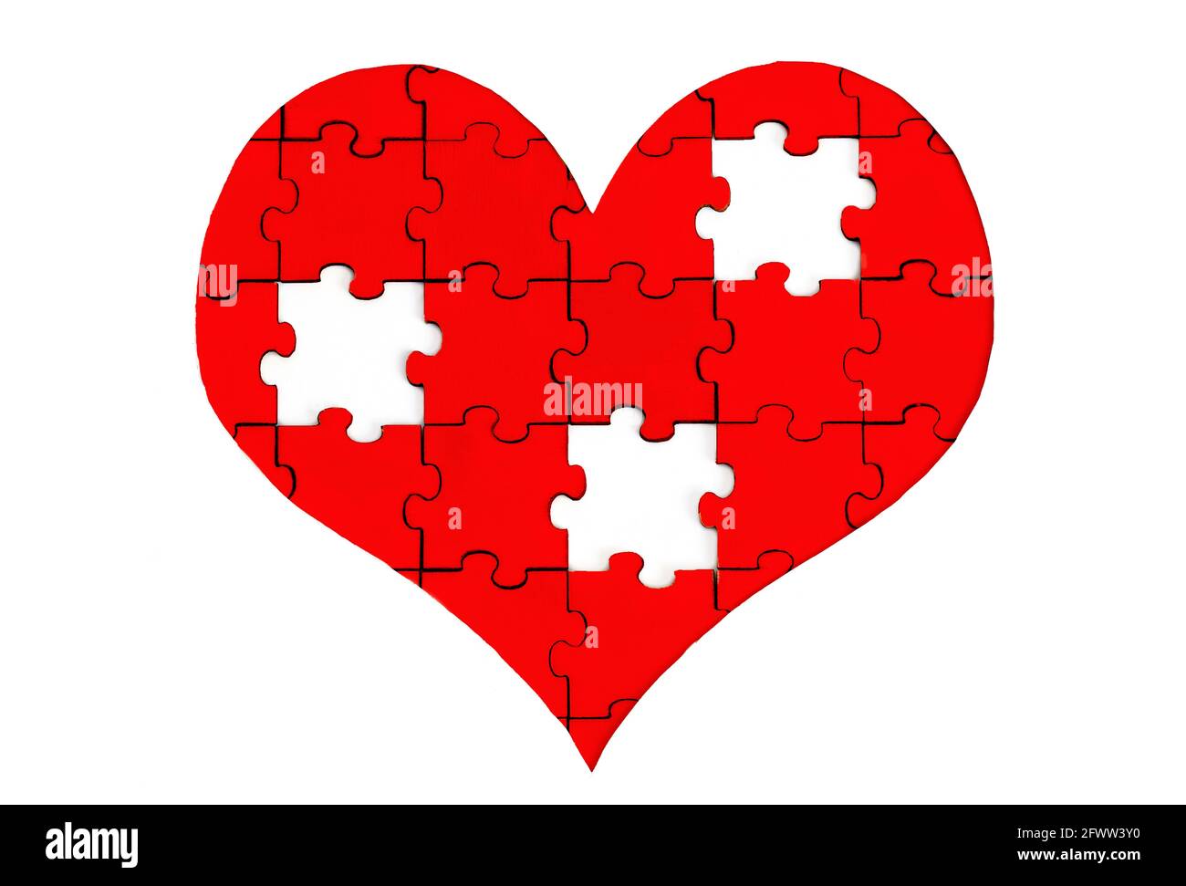 Red heart shaped jigsaw puzzle with three missing pieces isolated on white Stock Photo
