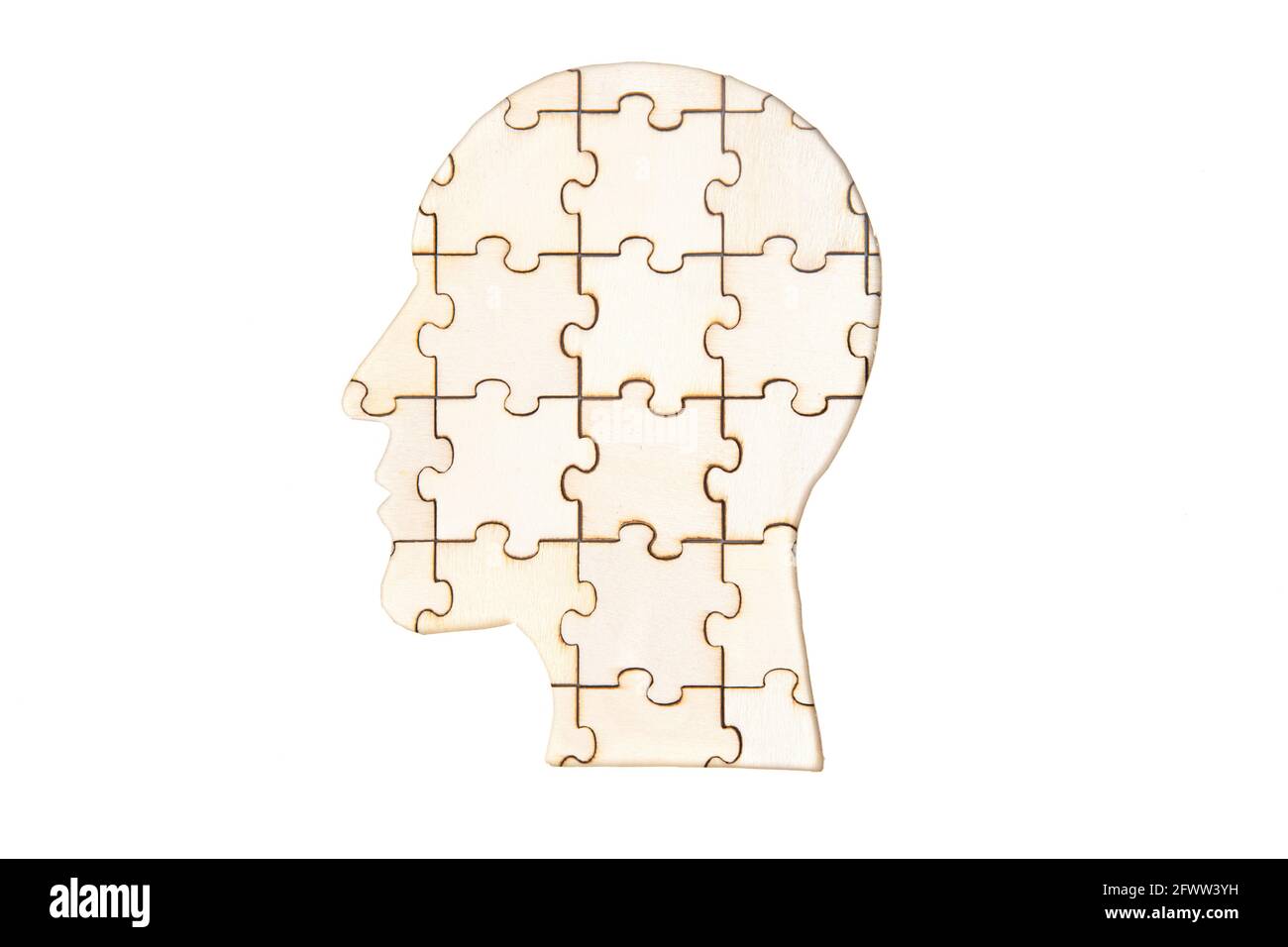 Silhouette of a man's head made from wooden puzzle pieces isolated on white Stock Photo