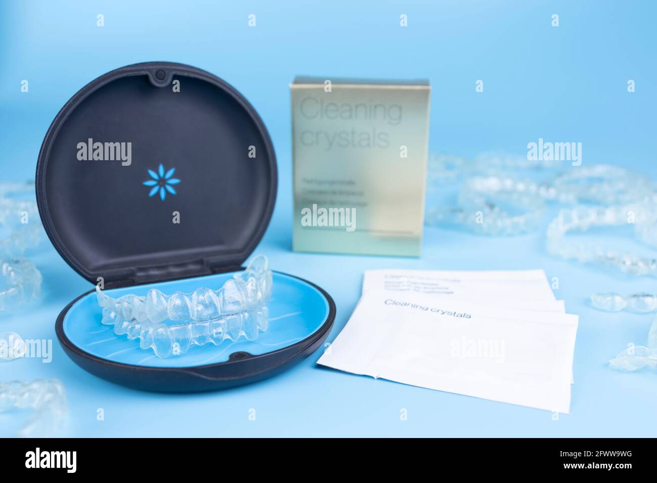 Invisible retainers case with orthodontic aligner brackets. Black