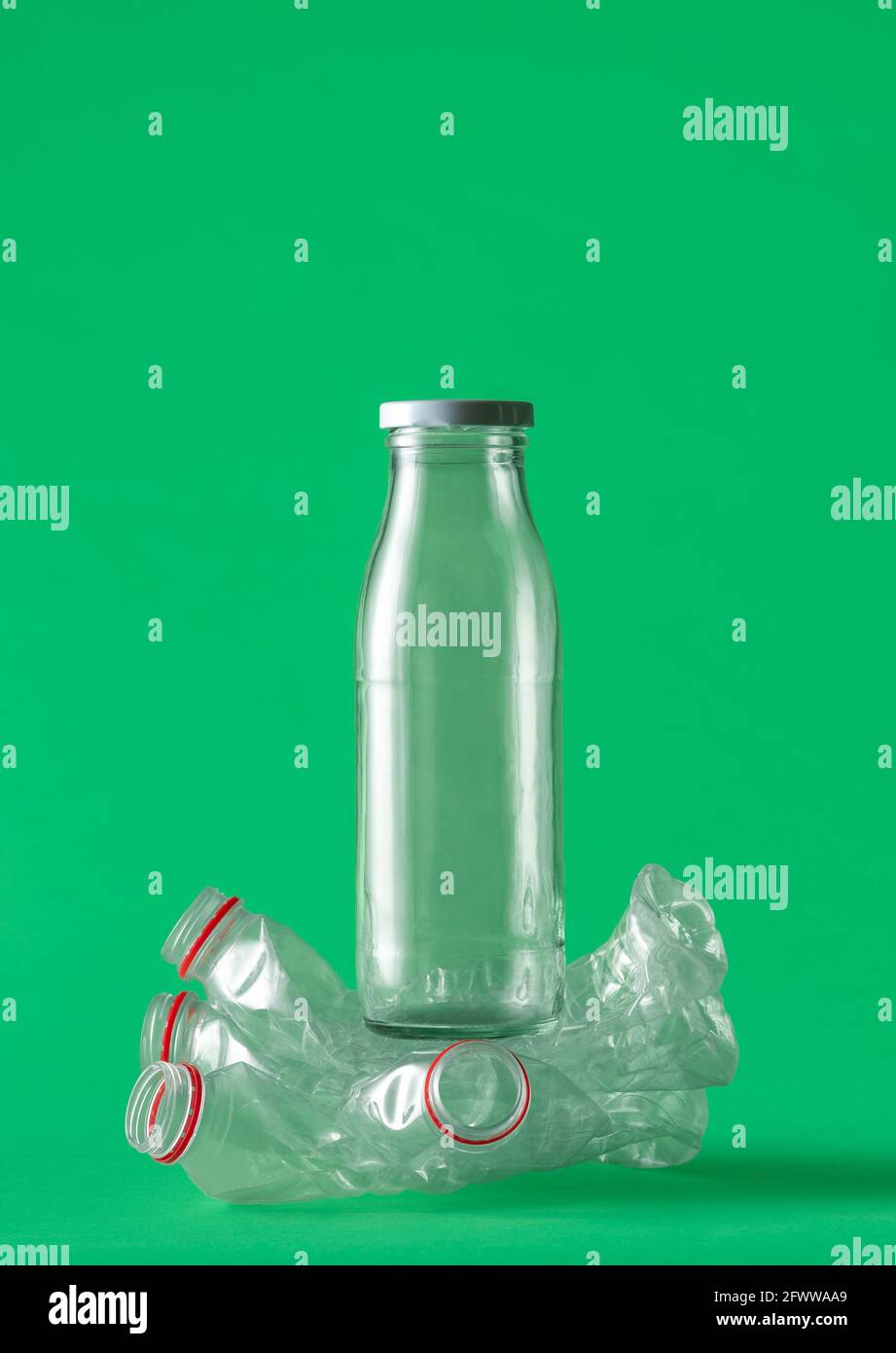 Glass bottle crushing plastic bottles as a concept for reusable