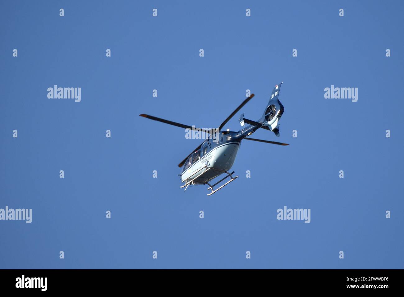 Buenos Aires, Argentina - September 28, 2020: Helicopter Airbus EC-135, tail number LQ-BXI, in flight. It is used by the Police of Argentina Stock Photo