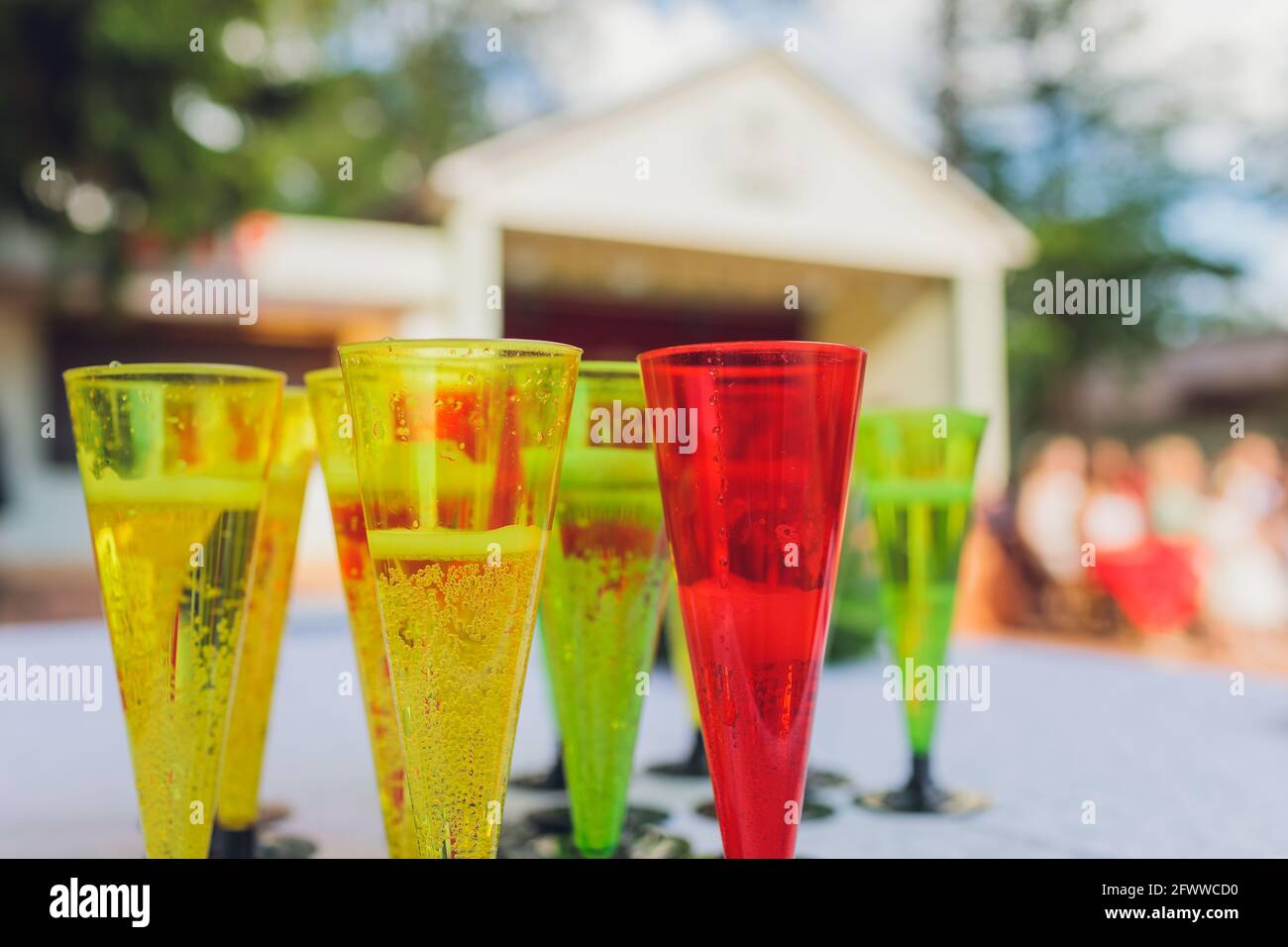 Misted glasses with multicolored cocktails with cocktail tubes close up Stock Photo