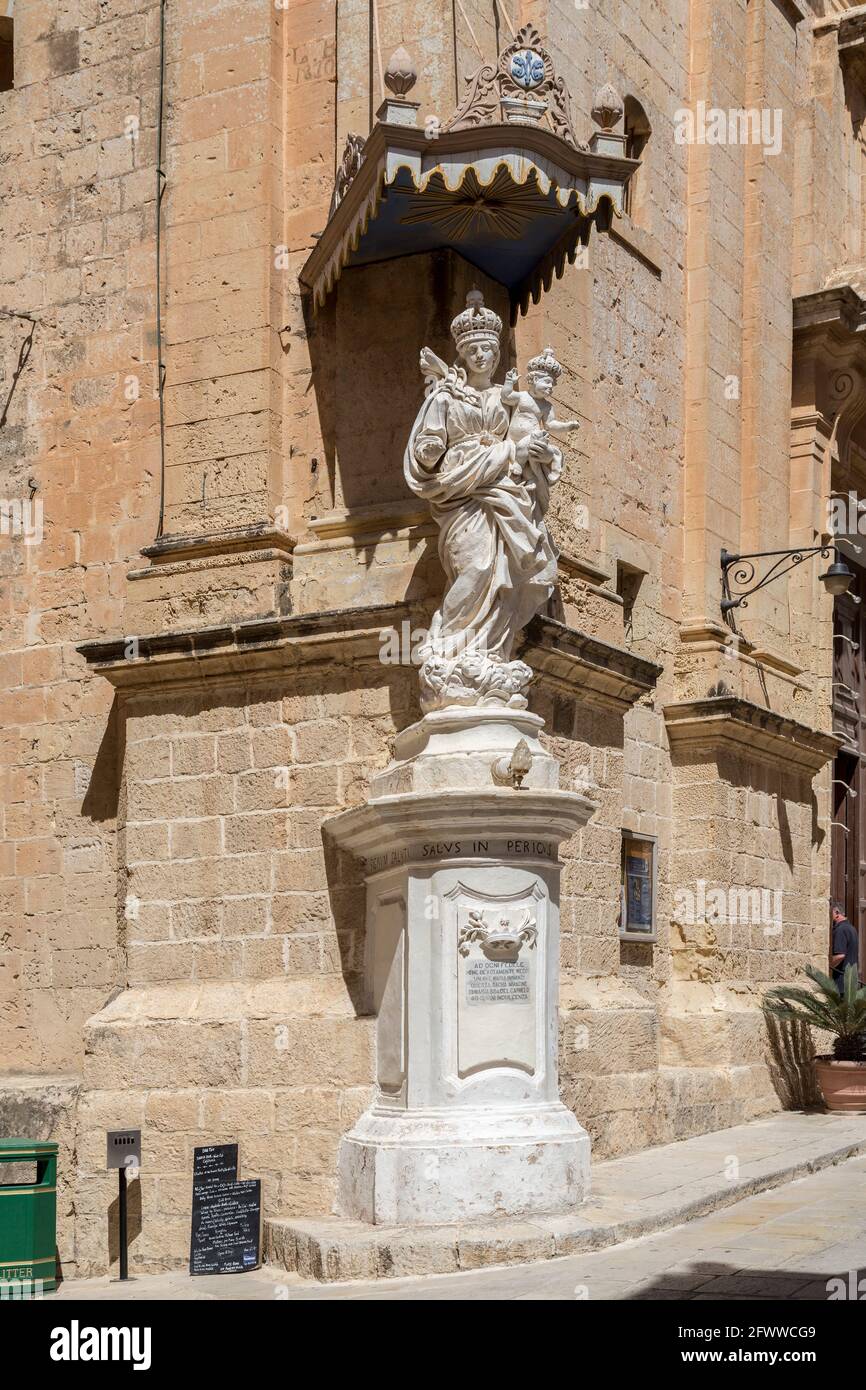 Ave Maria, Mary and Jesus statue outside the Church of the Annuncia, Silent City of Mdina, Malta Stock Photo