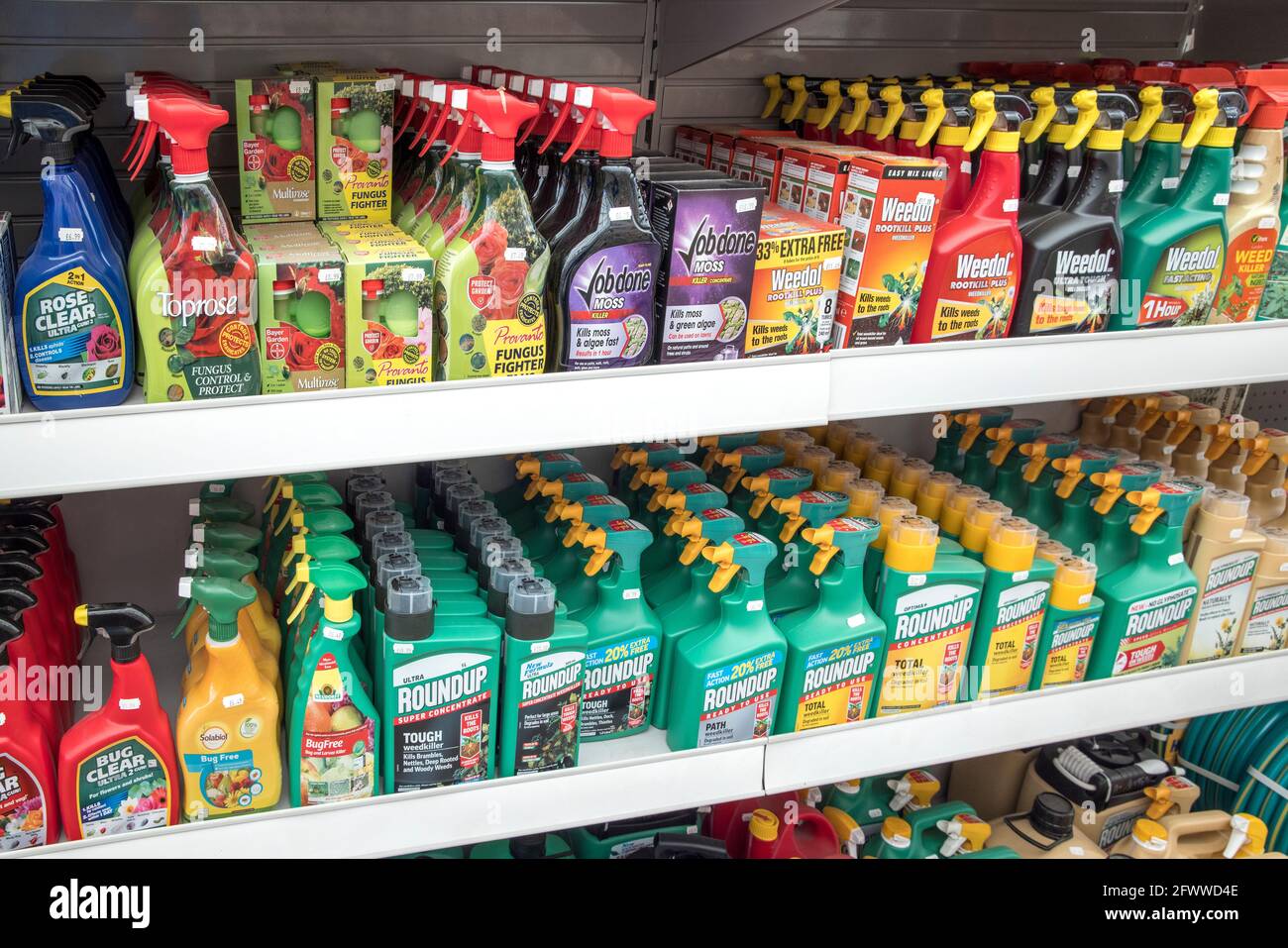 Weed killer on shelves for sale in garden centre, UK Stock Photo Alamy