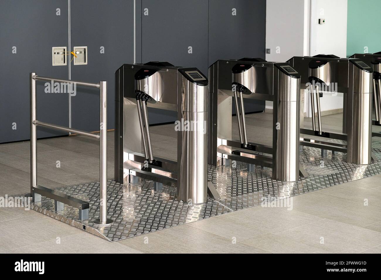 Disabled turnstiles during quarantine. Restriction of mass events. Sealed doors. Remote work Stock Photo