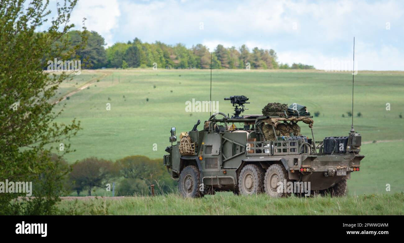 British army Jackal (MWMIK) Mobility Weapon-Mounted Installation Kit rapid assault, fire support & reconnaissance vehicle on maneuvers Stock Photo