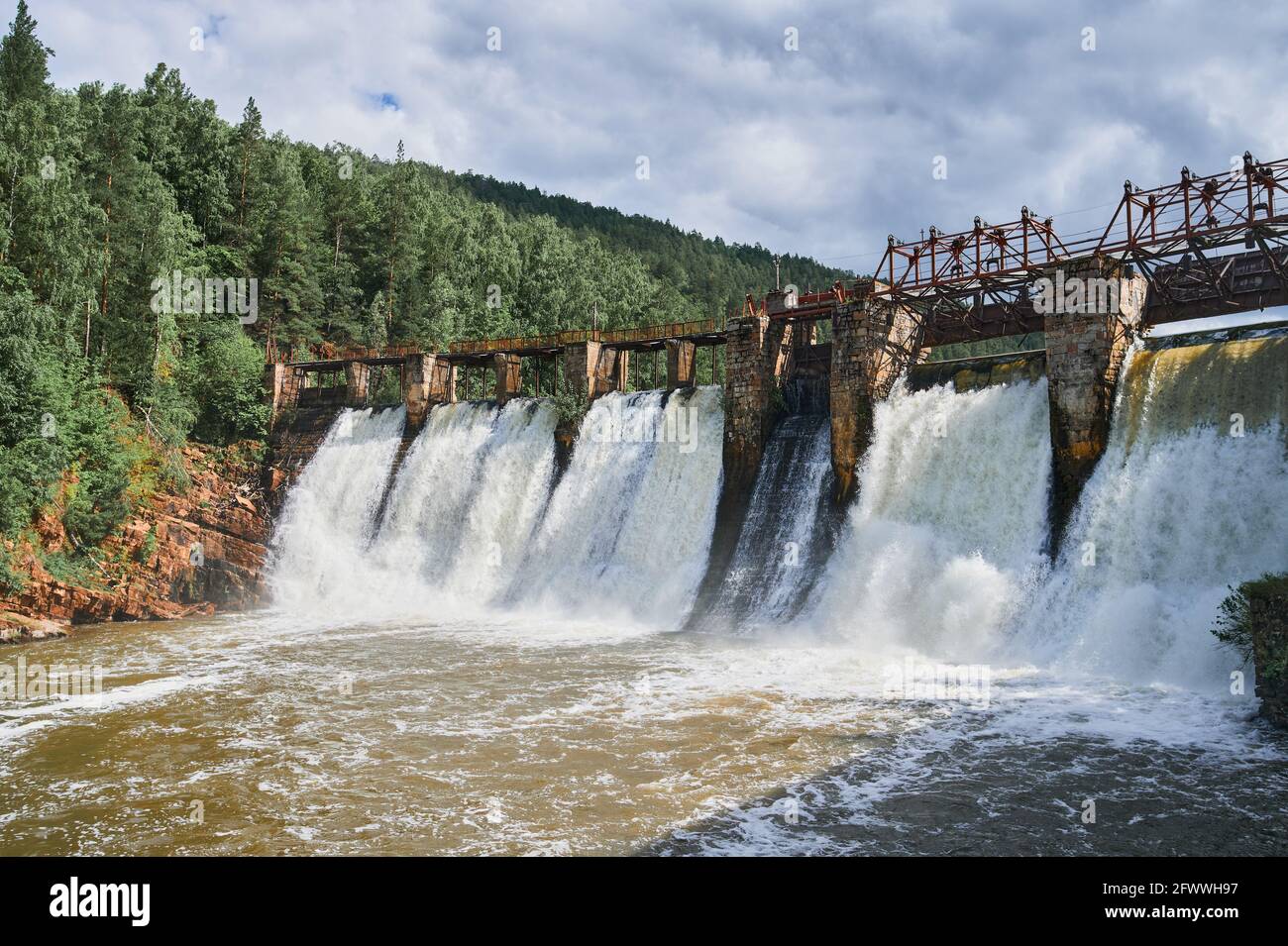 Dam over Eresma river, Segovia Spain . Pontoon Reservoir Stock Photo