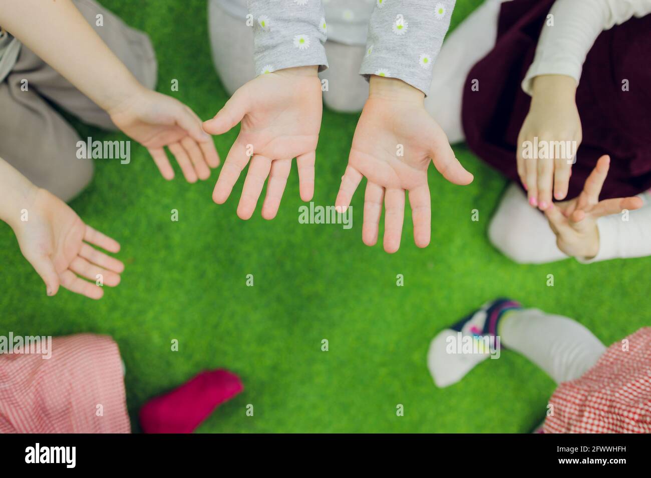 Many hands lying on top of each other Stock Photo Alamy