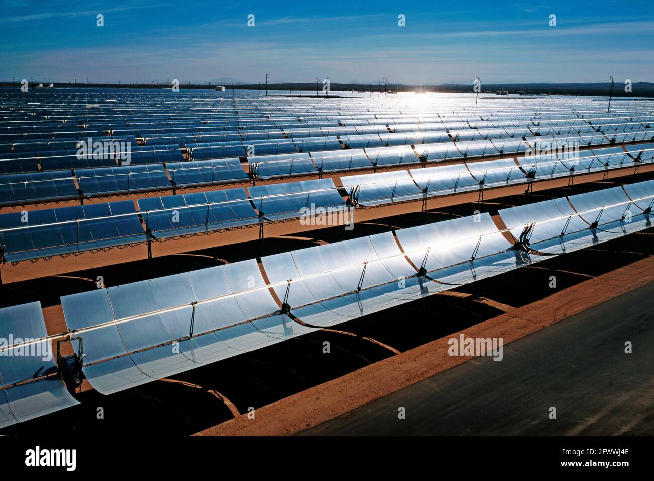 Solar electric collectors at sunrise at the power station in Kramer