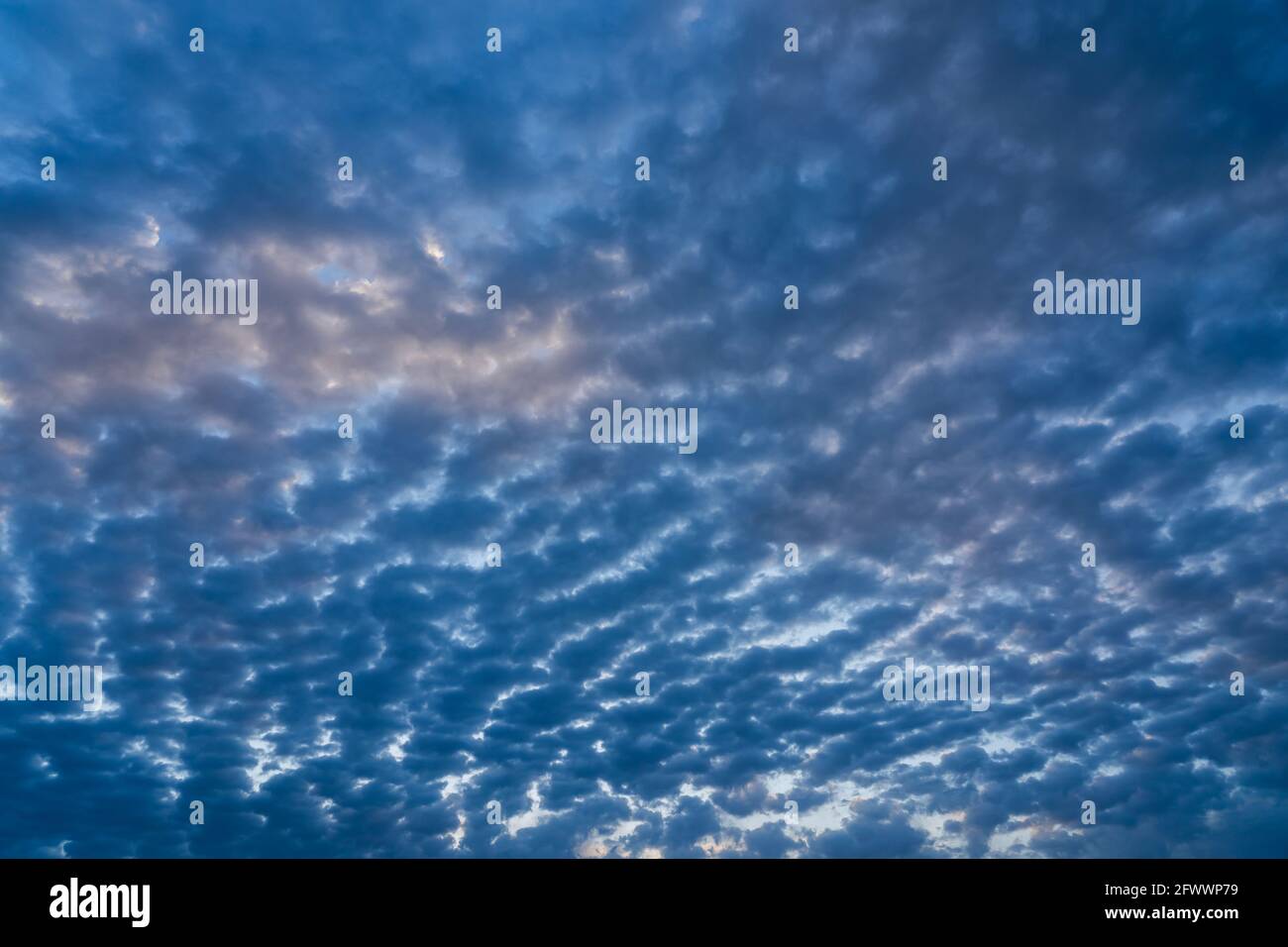 Beautiful clouds of different shapes in the sky before sunset Stock ...