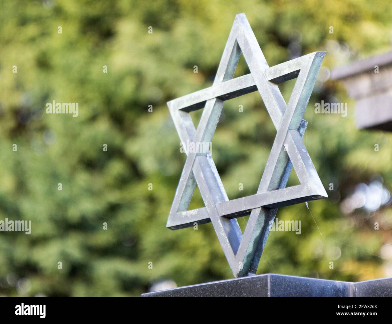 Valenciennes, France, 2017/01/05. Jewish tomb with a hexagram - six-pointed star at the cemetery of Saint Roch. Stock Photo
