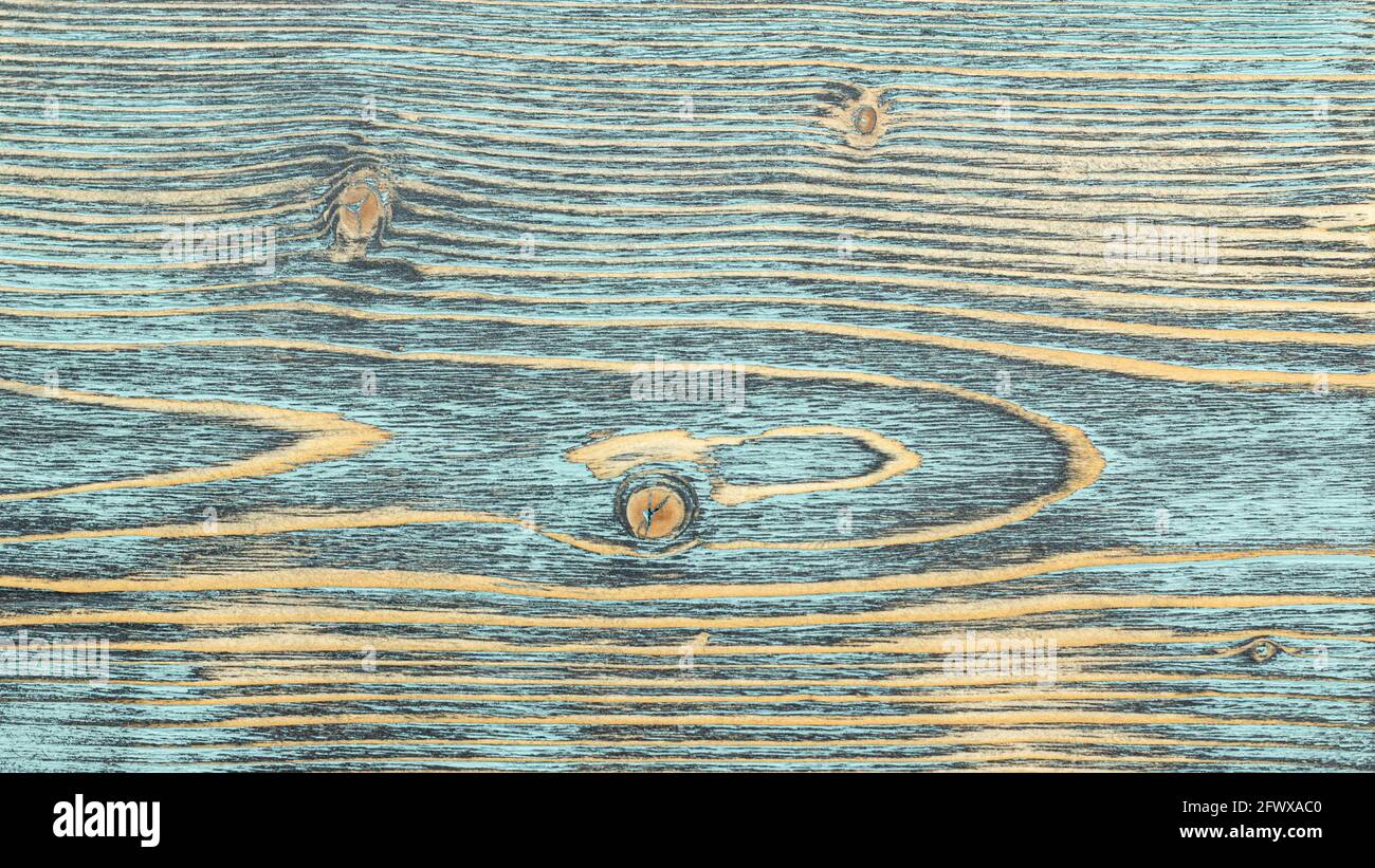 Blue painted solid pine wood texture background. Background of aged pine solid wood. Detail of a
