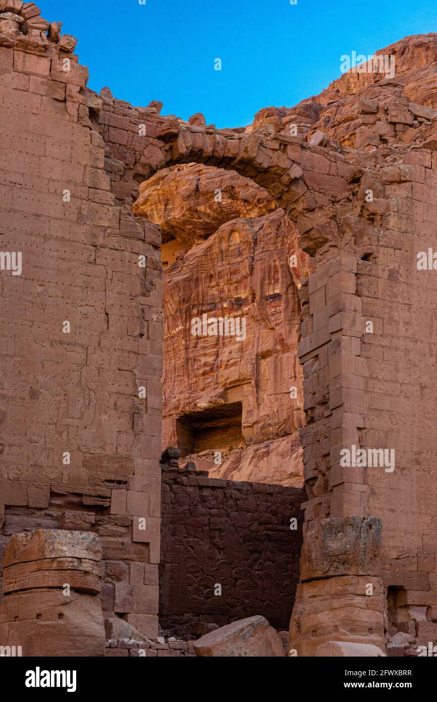 Front arched entrance to Qasral-Bint Far'un,free-standing monument, the main temple of the ancient Nabataean culture in Petra, Jordan Stock Photo