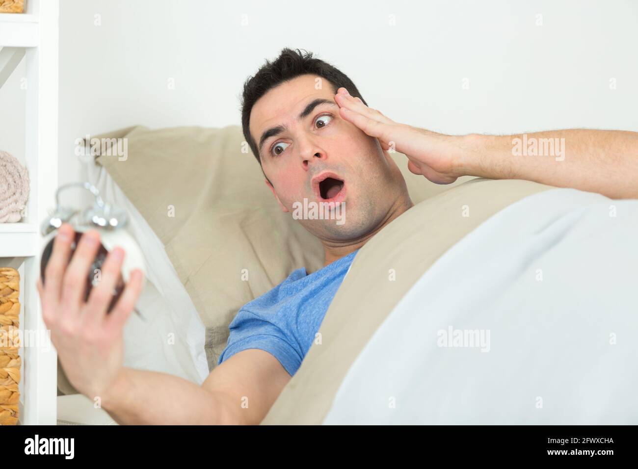 Adult man wakes up hi-res stock photography and images - Alamy