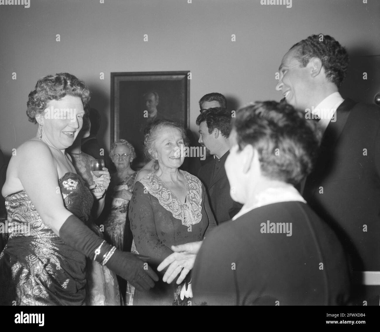 Opening of the 26th Book Week at the Concertgebouw in Amsterdam, during the intermission; Queen Juliana and Mrs. Pothast-Limberg, February 24, 1961, B Stock Photo