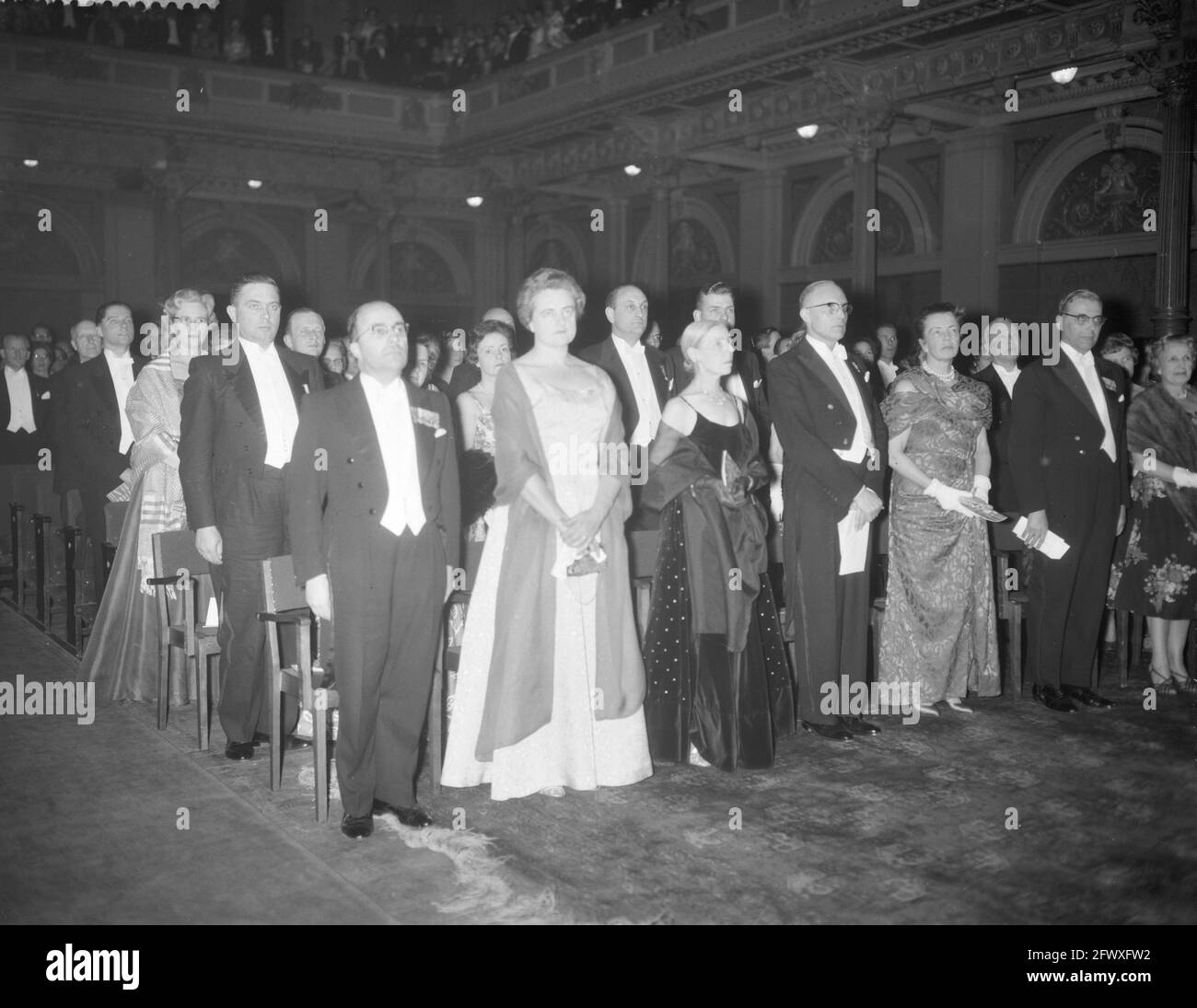 Opening of the 25th Book Week in the Concertgebouw, from left to right Minister Mr. J. M. L. Th. Cals , Mrs. Cals Mr. Chr. Leeflang , Chairman of the Stock Photo