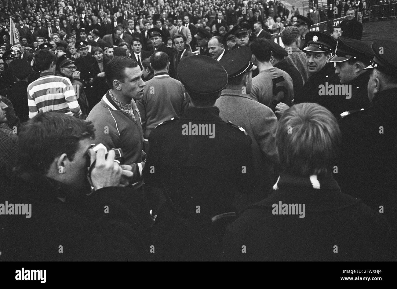 Protesting spectators enter the field, November 6, 1966, internationals, policemen, sports, soccer, The Netherlands, 20th century press agency photo, Stock Photo