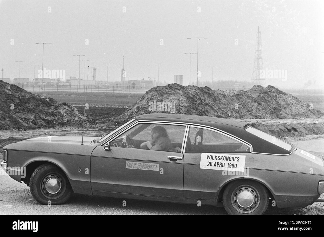 Protest rally in East Groningen because of economic problems there; car at gas extraction field, March 15, 1980, cars, protests, banners, The Netherla Stock Photo