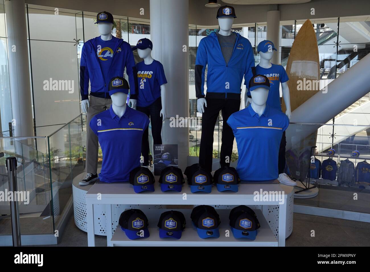 Los Angeles Rams apparel and 2021 Draft Day hats on display at the