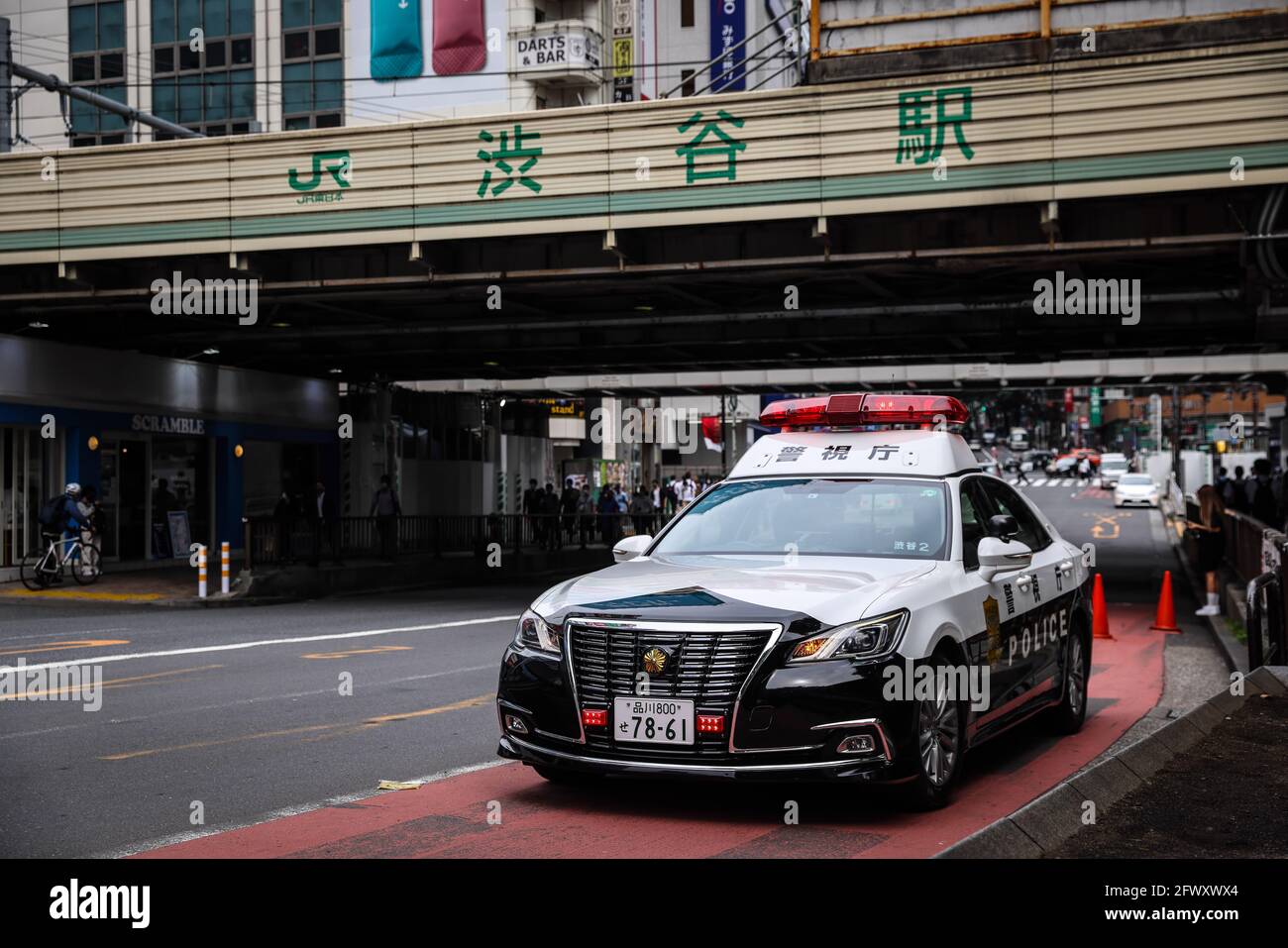 Tokyo, Japan. 24th May, 2021. A view of a Japanese Police car parked near Shibuya Station in central Tokyo.Tokyo City Government informs the public about the ongoing danger of the Coronavirus Pandemic and new Covid-19 mutation during the State of Emergency in Tokyo (Photo by Stanislav Kogiku/SOPA Images/Sipa USA) Credit: Sipa USA/Alamy Live News Stock Photo
