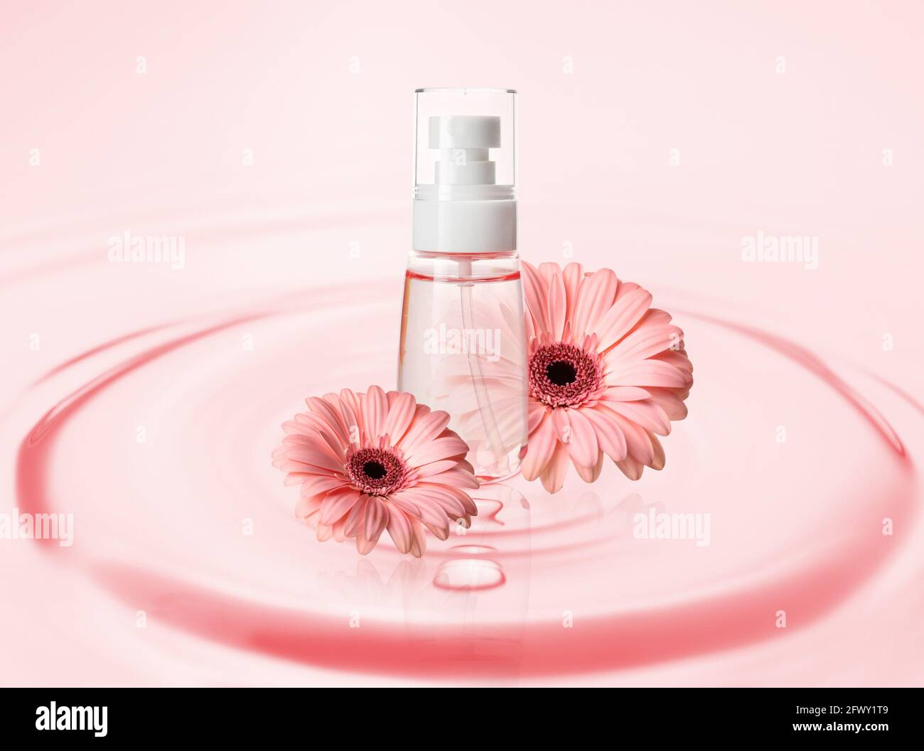 Natural shampoo with flowers in clean water Stock Photo - Alamy
