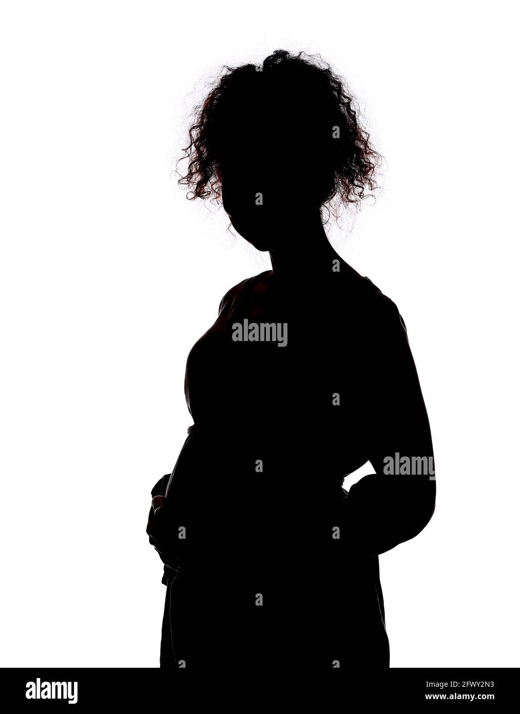 Silhouette of pregnant woman on white background Stock Photo - Alamy