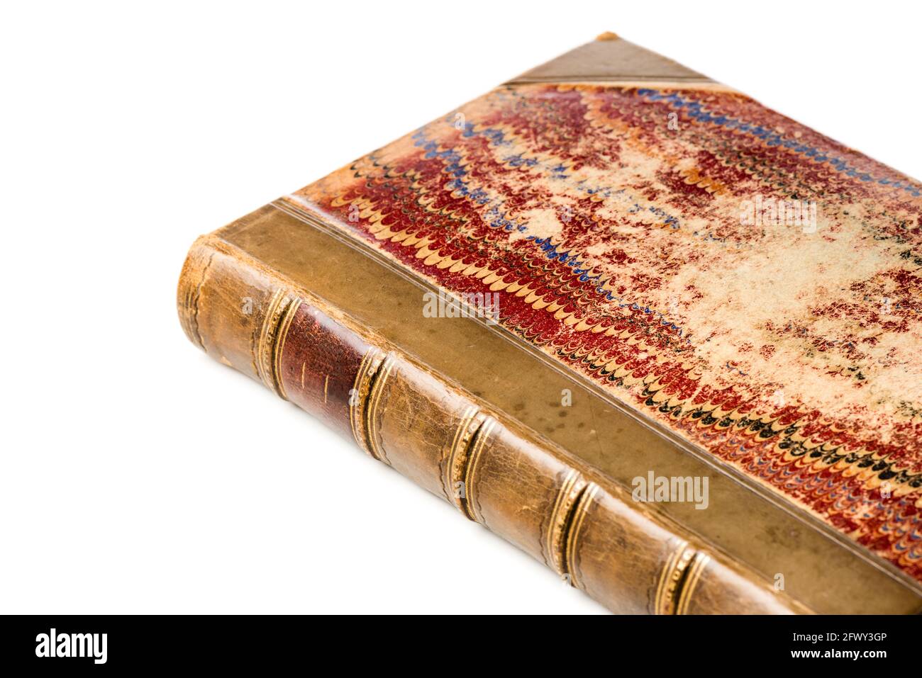 antique leather bound book with marbling paper cover isolated over