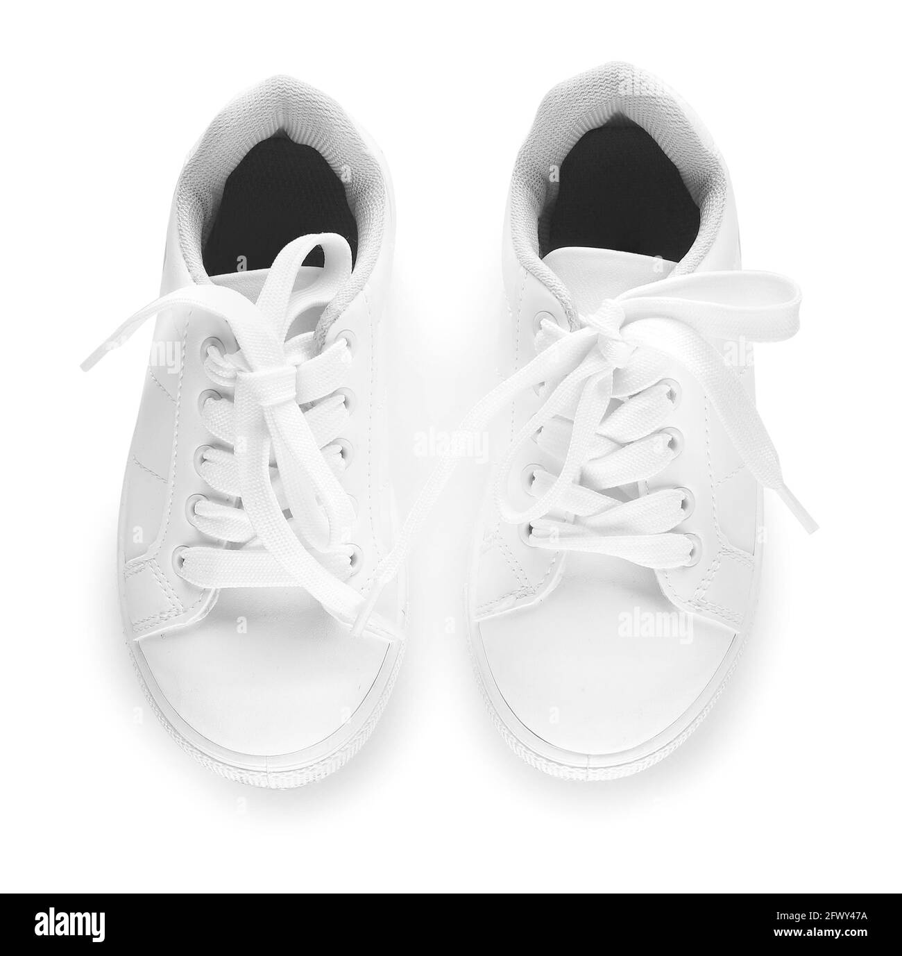 Children's shoes on white background Stock Photo Alamy
