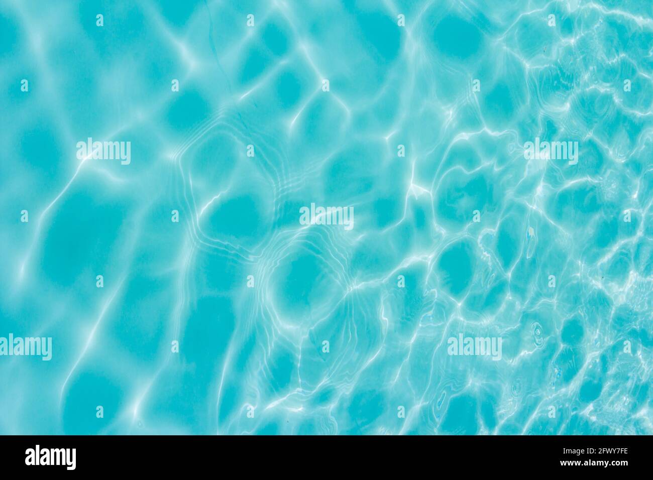 Shining light blue water wave texture background Stock Photo - Alamy