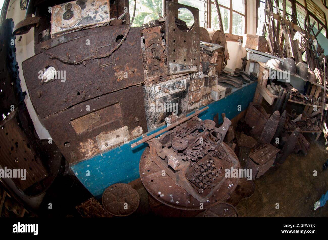 Japanese World War II typewriter, radios, firearms and ammunition, Gua Binsari where 5000 Japanese were killed, Biak, West Papua, Indonesia Stock Photo
