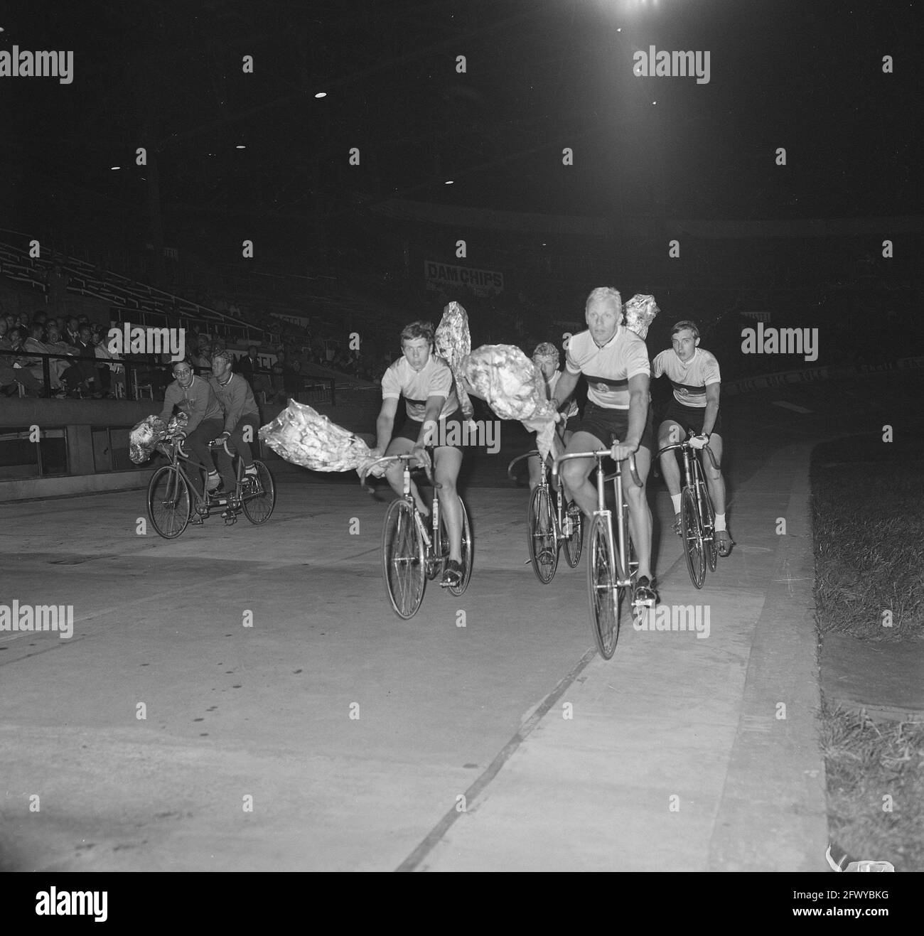 Honorary lap with flowers by a number of cyclists, June 17, 1971, track cycling, flowers, athletes, competitions, cycling, The Netherlands, 20th centu Stock Photo