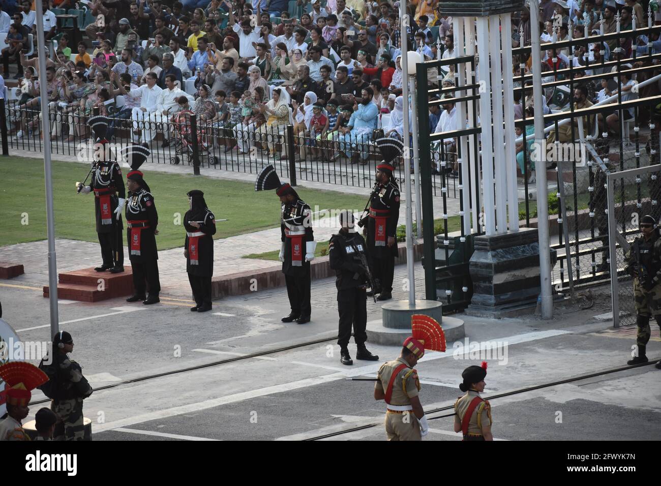 Photographic footage of the daily closing ceremony of the Wagah-Attari ...