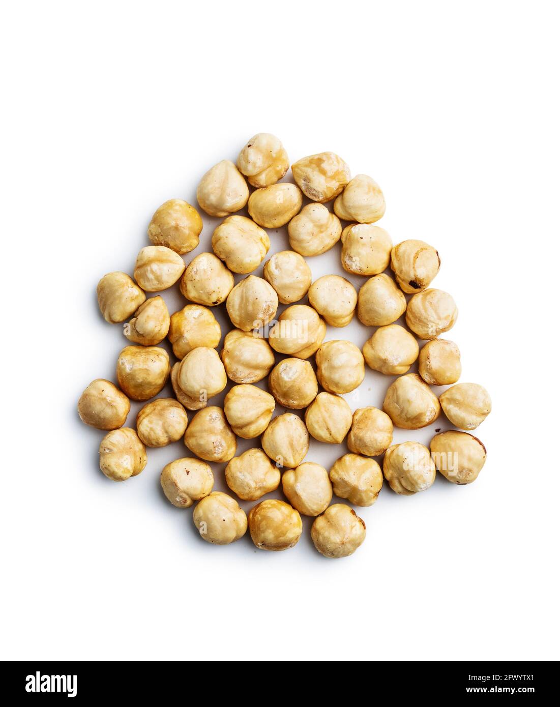 Peeled roasted hazelnuts isolated on white background. Stock Photo