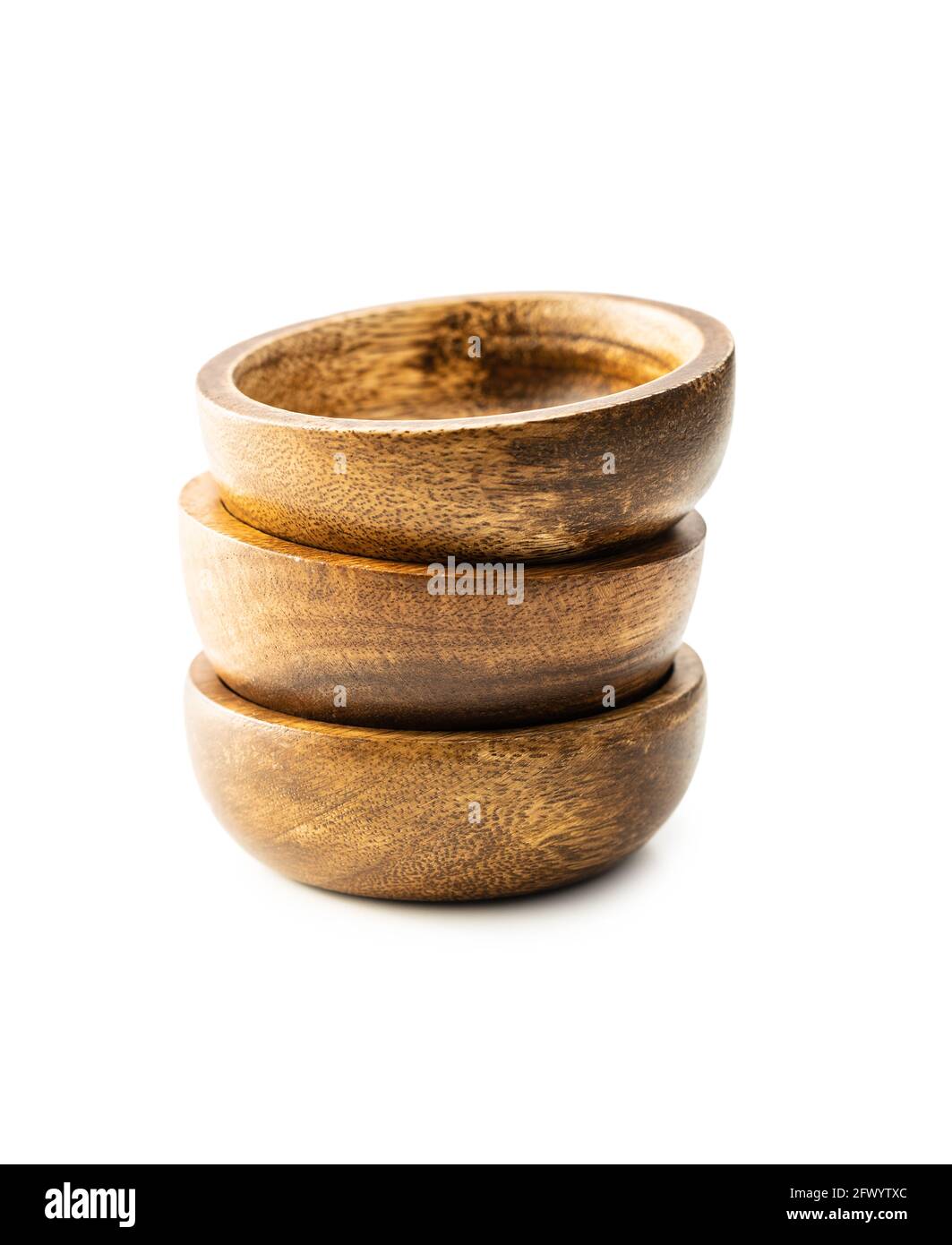 Three empty wooden bowl isolated on white background. Stock Photo