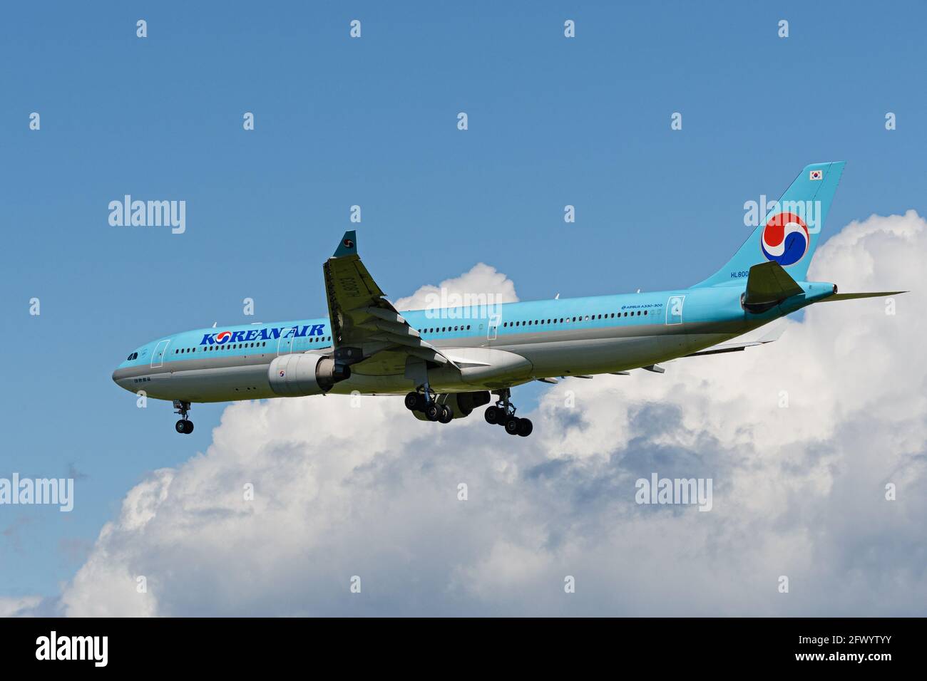Richmond, British Columbia, Canada. 18th May, 2021. A Korean Air Airbus A330-300 jet (HL8003) airborne on final approach for landing at Vancouver International Airport. Credit: Bayne Stanley/ZUMA Wire/Alamy Live News Stock Photo