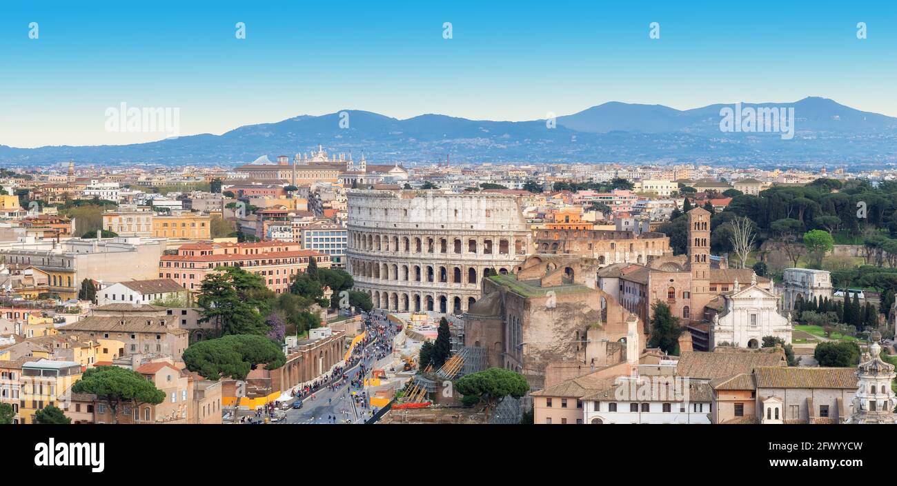 Colosseum in Rome. Rome skyline. Panoramic view of Rome, Italy. Stock Photo