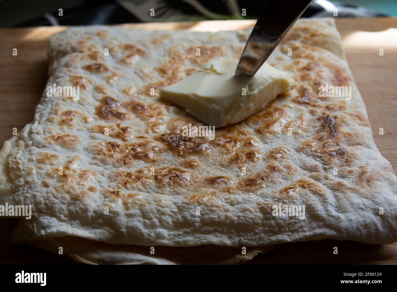two side with natural butter. traditional turkish cuisine flatbread