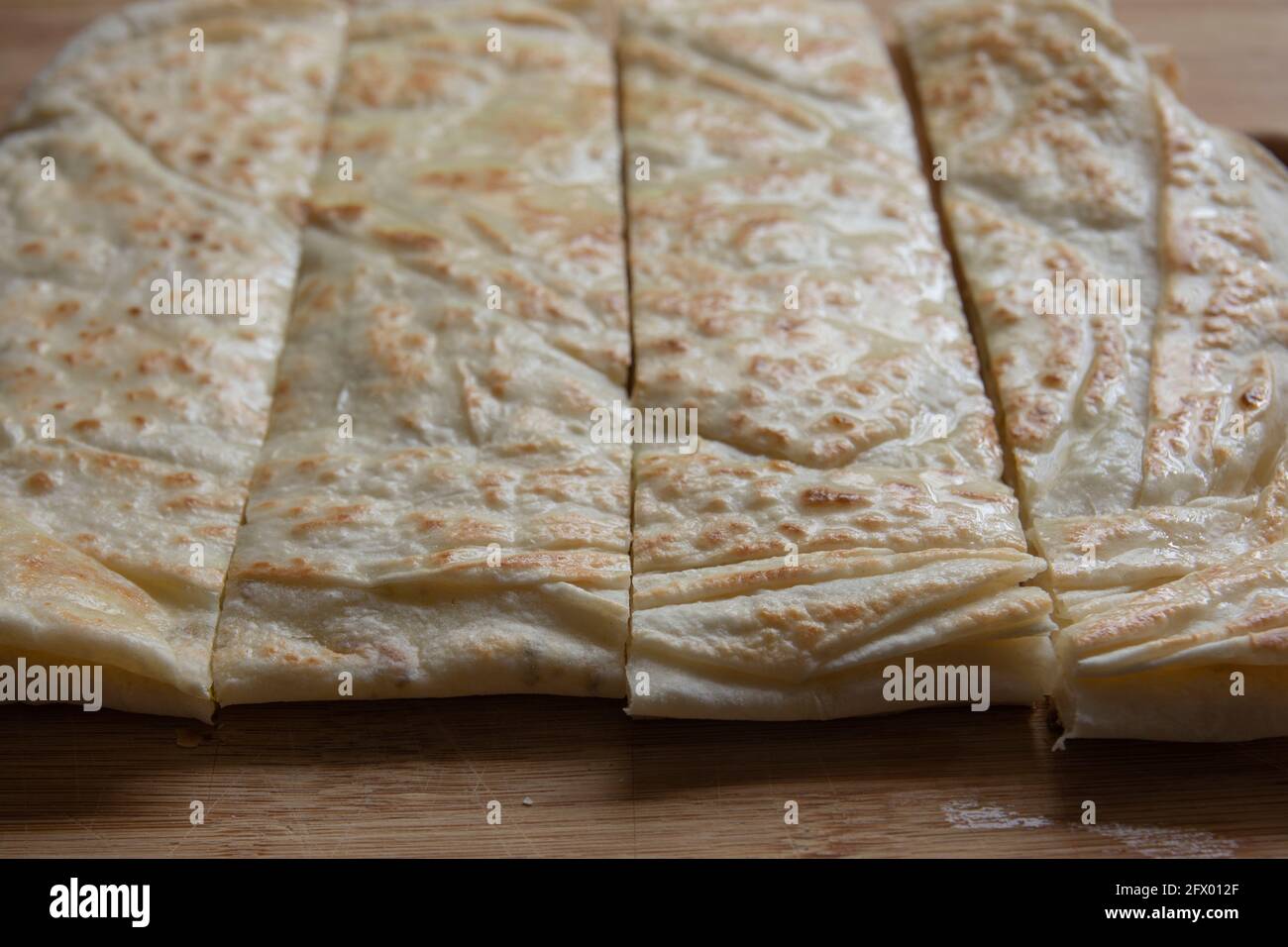 cut and ready to serve. traditional turkish cuisine flatbread. With