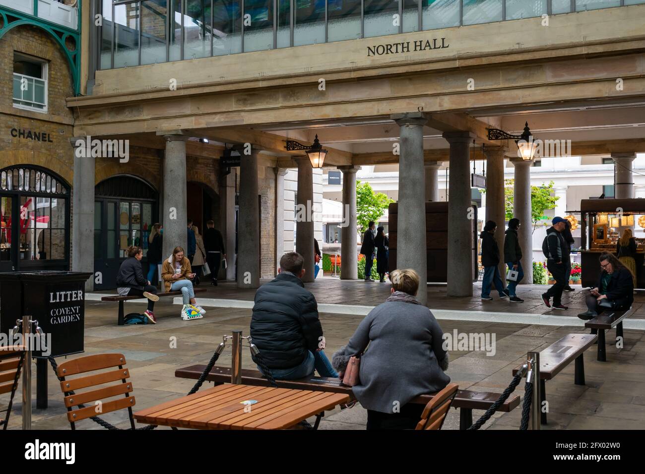 London. UK- 05.23.2021. Interior of the North Hall of Covent Garden Market with crowd of visitors and toursit returning as the economy reopens. Stock Photo