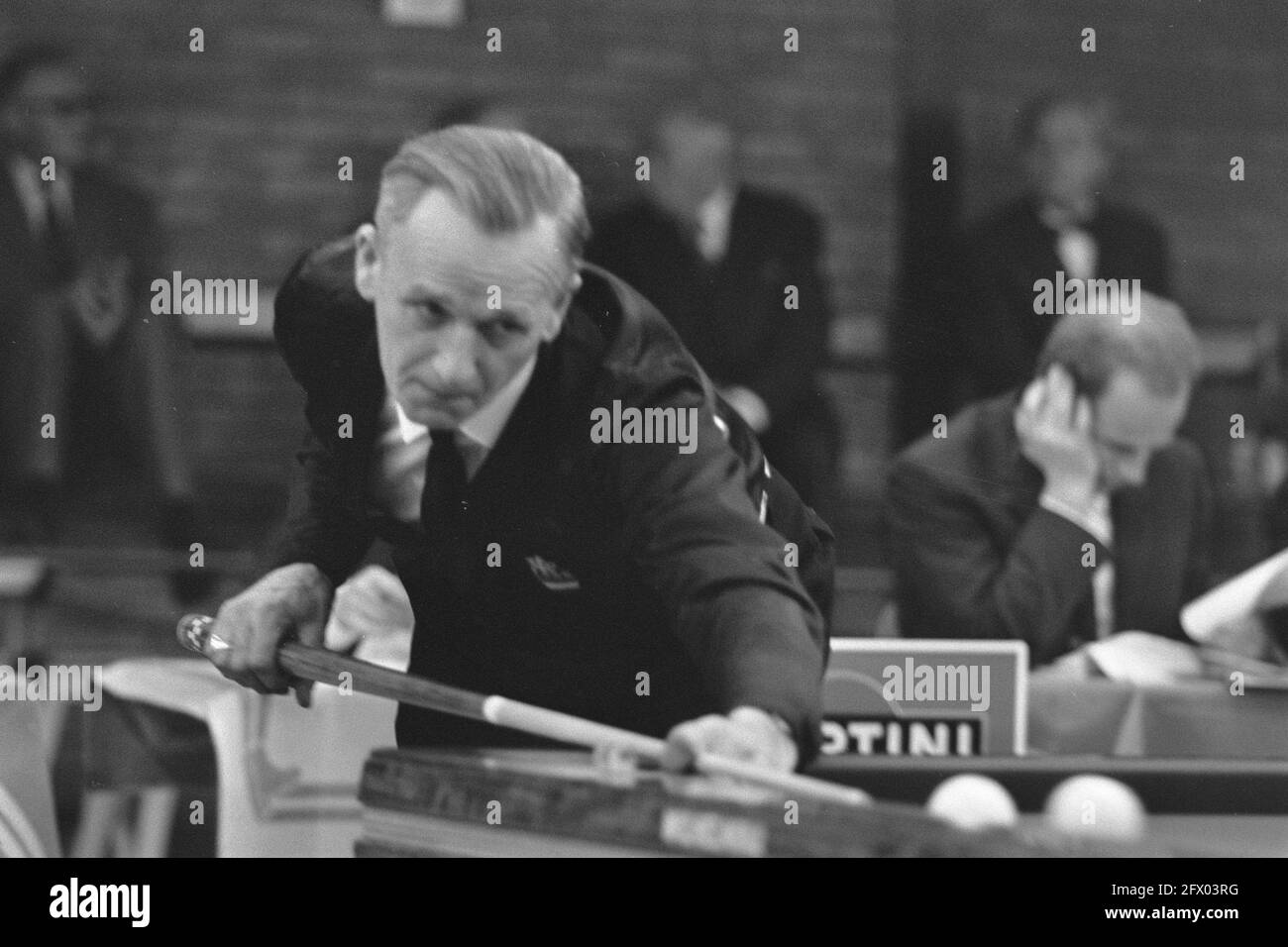 European Championship Three-Band in The Hague No. 12A, Rini van Bracht in action, No. 9A, 10A: Jan Doggen in action, No. 11A, A. Rico, January 16, 1969, CHAMPIONSHIPS, billiards, The Netherlands, 20th century press agency photo, news to remember, documentary, historic photography 1945-1990, visual stories, human history of the Twentieth Century, capturing moments in time Stock Photo