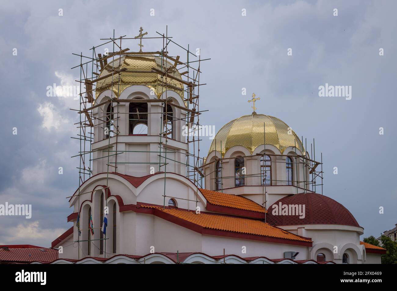 A newly constructed building of the church - scaffolding cladding domes ...