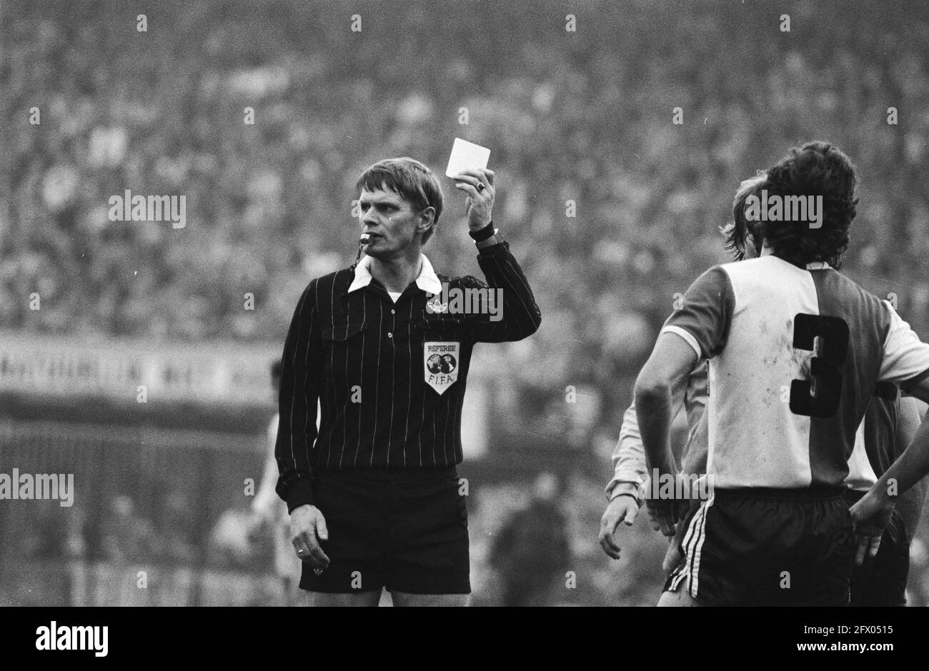 Footballers yellow card Black and White Stock Photos & Images Alamy