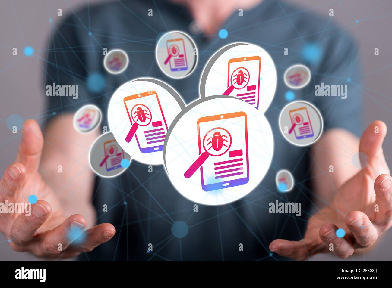 Software testing concept between hands of a man in background Stock Photo
